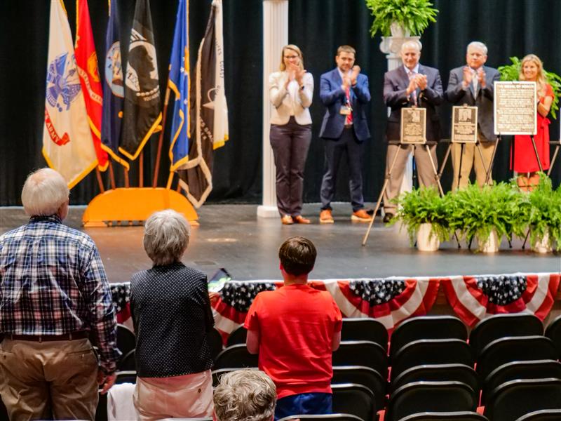 James Howe's relatives clapping during ceremony