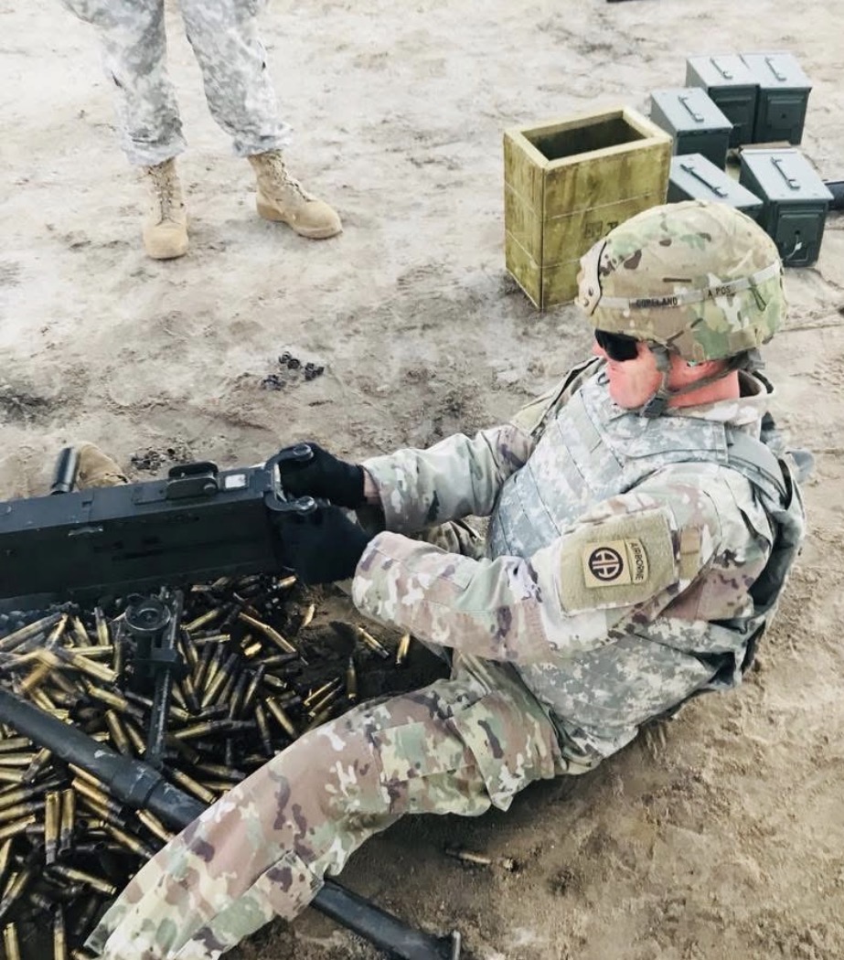 SSG Copeland firing M2 Browning machine gun in uniform