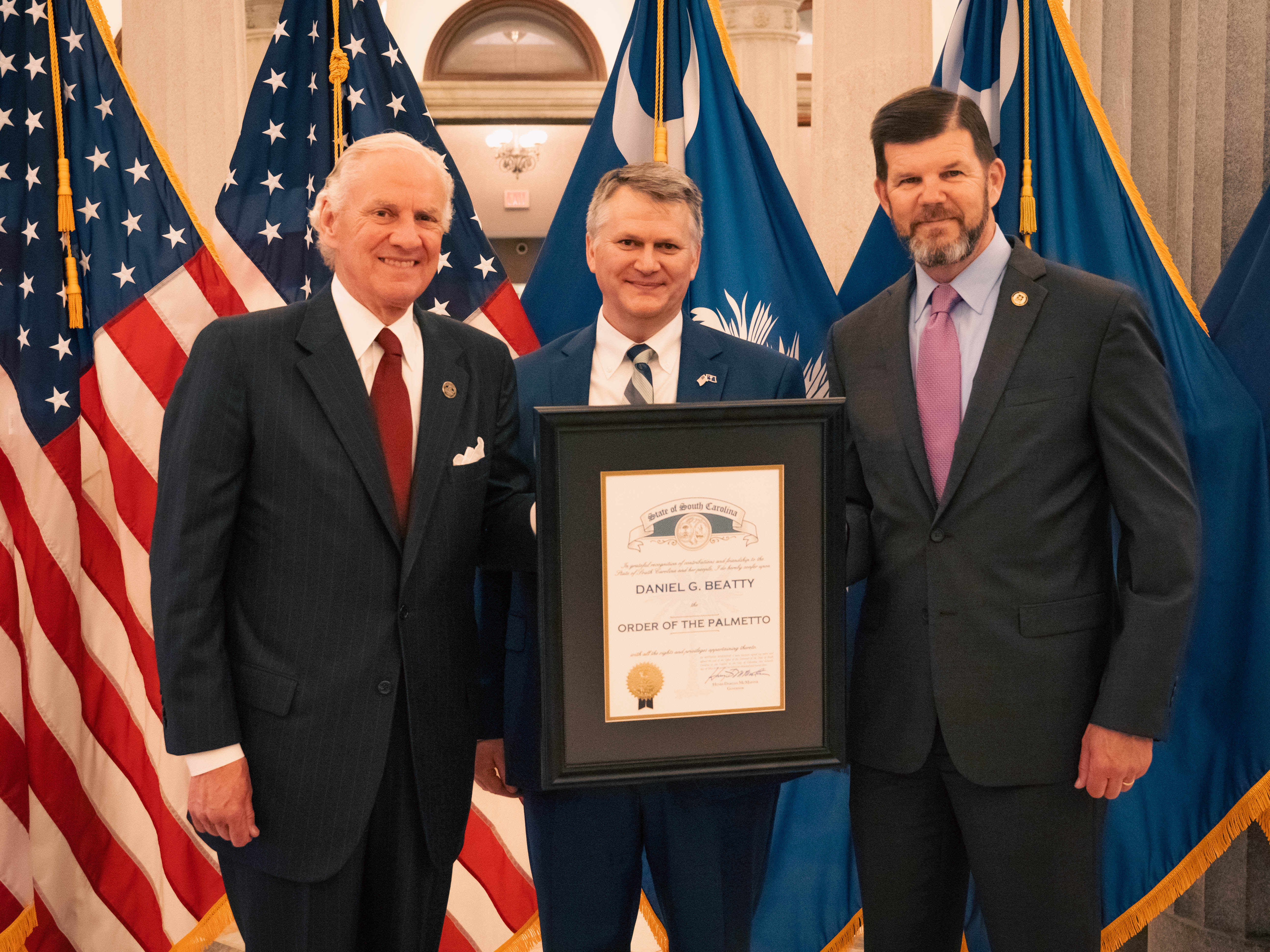 Governor McMaster, Dan Beatty, and Secretary McCaffrey 