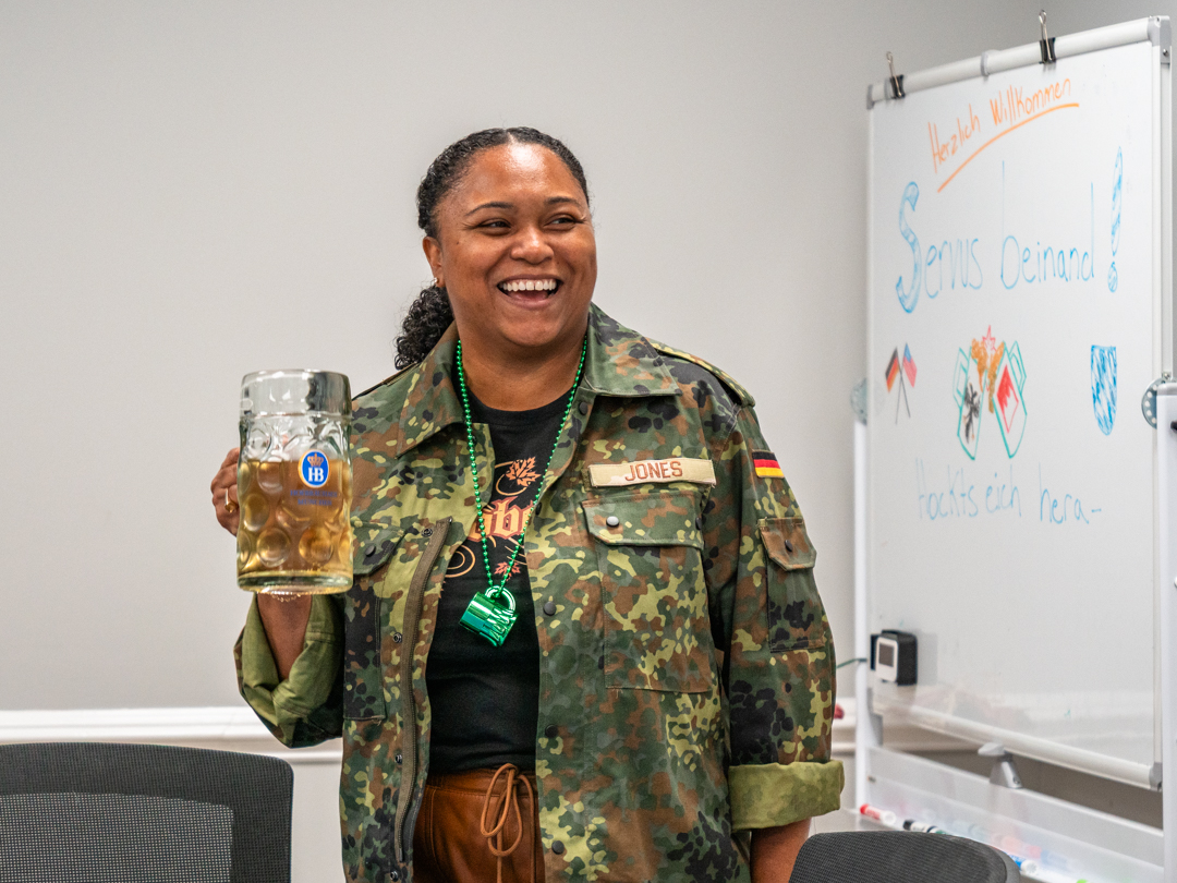 Erika Jones holds a glass of stein full of ginger beer during SCDVA's Oktoberfest luncheon on Oct. 7, 2026.