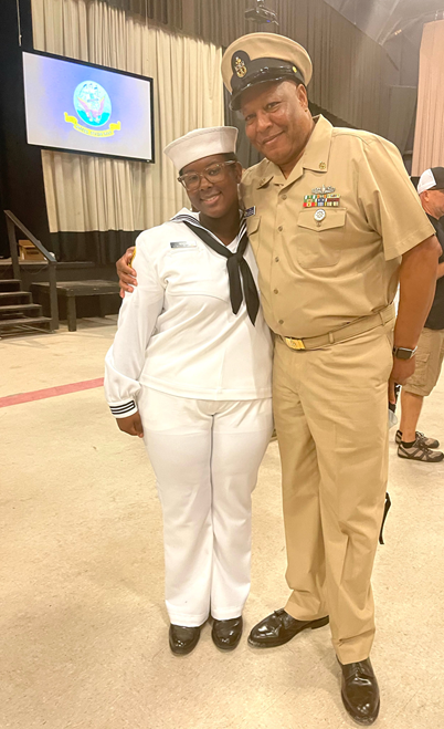 Rickey L. Mack in uniform posed with another service member