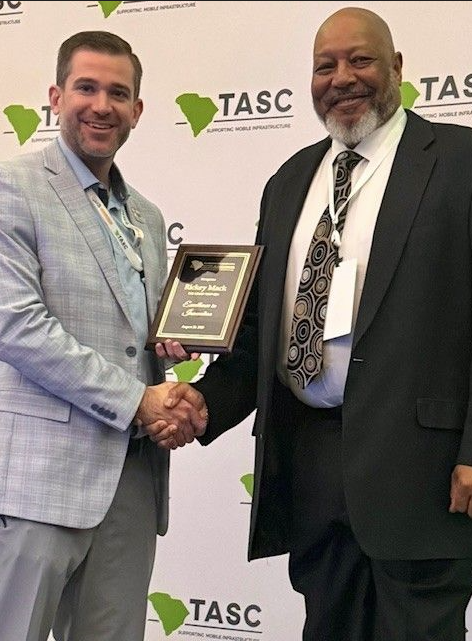 Mack receiving TASC Award 